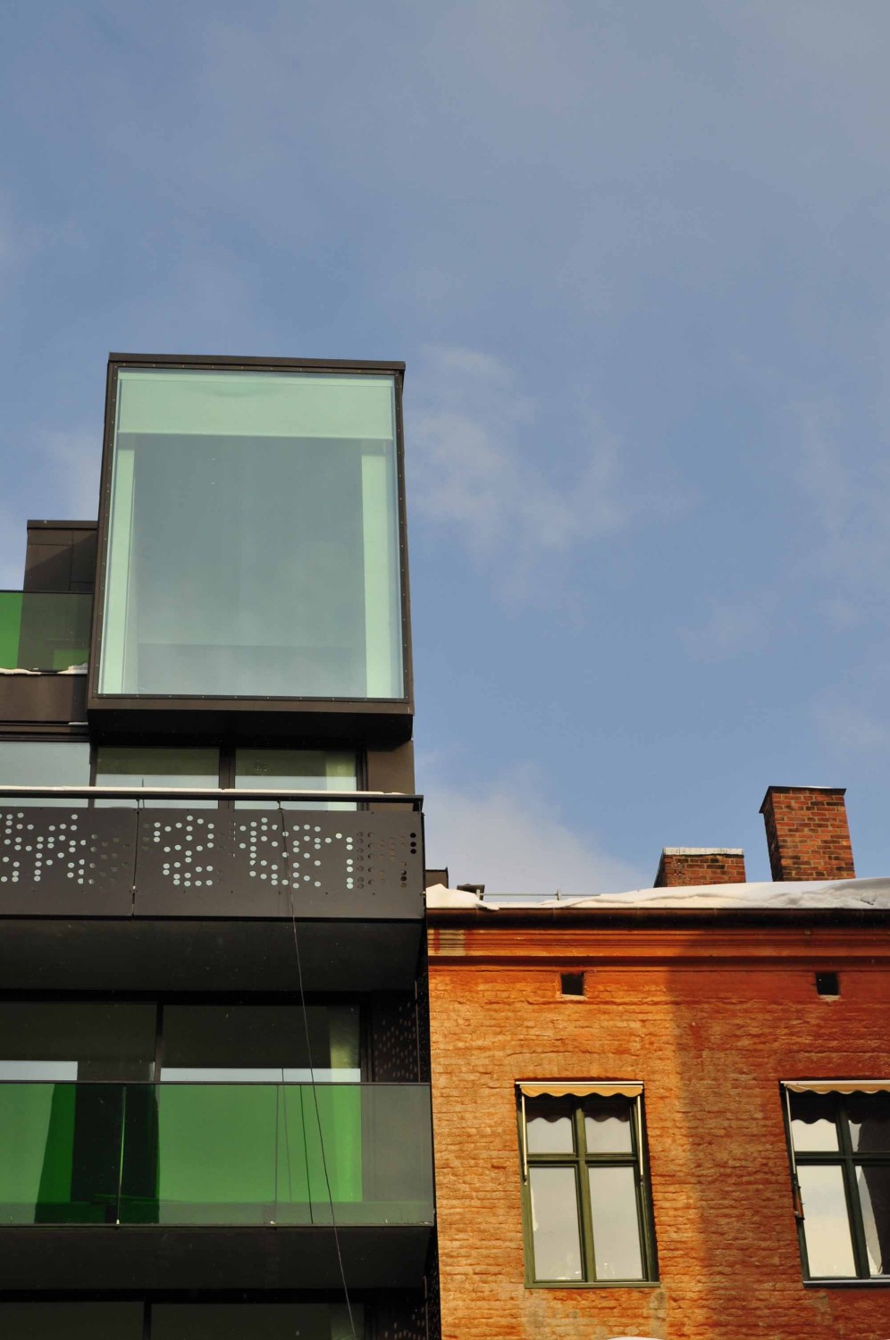 Aus den obersten Apartments genießen die Bewohner den Ausblick durch große Glasscheiben