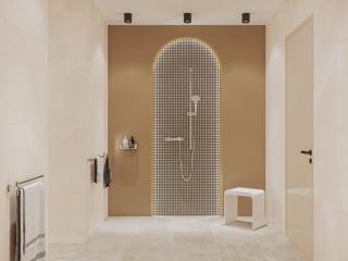 Ein weißer Badhocker lädt in der Dusche zum Sitzen ein. 