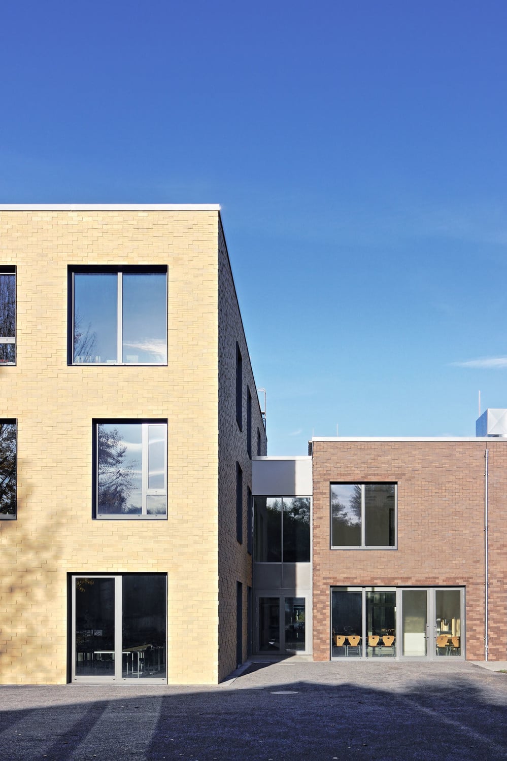 Haus C überragt die anderen Baukörper um ein Geschoss