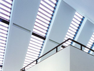 Beim Alten Hof in München kommen in den Dachschrägen Baguettes mit dreieckigem Querschnitt zum Einsatz; Architektur: Auer + Weber + Architekten, München
