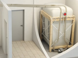 Ein Vakuumsaugsystem mit Förder- und Rückluftleitung verbindet den Pellet-Gewebesilo mit dem Heizkessel