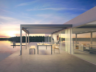 Geradlinig: Das Glas-Terrassendach Terrazza Pure von Weinor harmoniert mit reduziert gestalteter Wohnarchitektur.