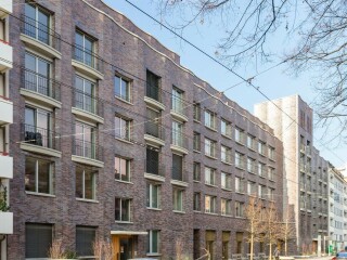 Das neue Kirchenzentrum St. Christophorus in Basel vereint Kapelle, Saal, Vereinsräume, Kindergärten, Alterswohnungen und Mietwohnungen unter einem Dach.