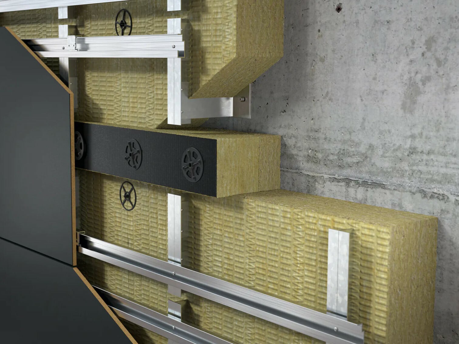 Das Brandriegel-System besteht aus zwei Steinwolledämmplatten und einem Abstandhalter.