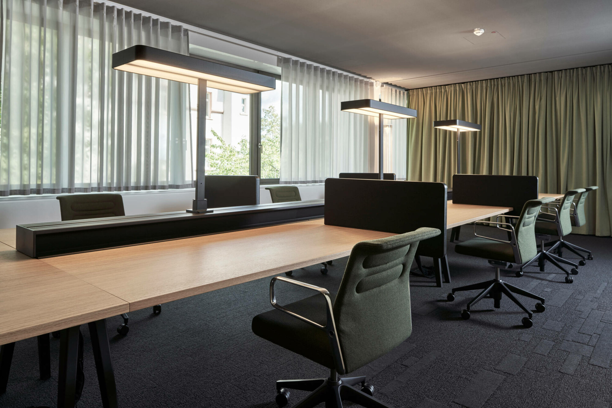 30 neue Arbeitsplätze, Büro-, Besprechungs- und Tagungsräume sowie eine Tiefgarage erweitern nun den Versicherungshauptsitz.