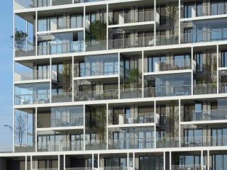 Umlaufende Balkone umschließen den Refuga Wintergarden Tower in Hasselt. Verglasungen erlauben ihre ganzjährige Nutzung, denn sie bieten Schutz vor Wind, Niederschlägen, Kälte und Schnee. Architektur: Atelier Kempe Thill