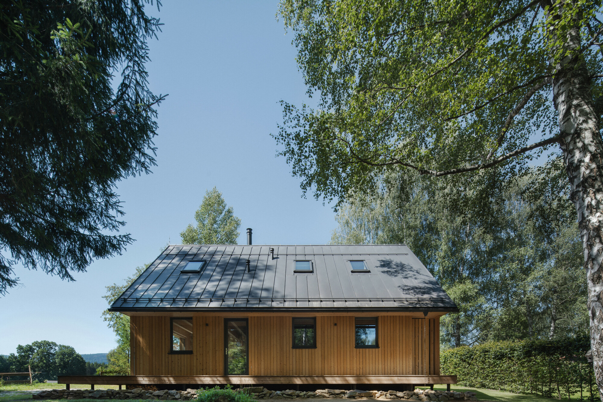 Veranda an der Ostseite mit Fenstertür am Wohnraum mit Küche