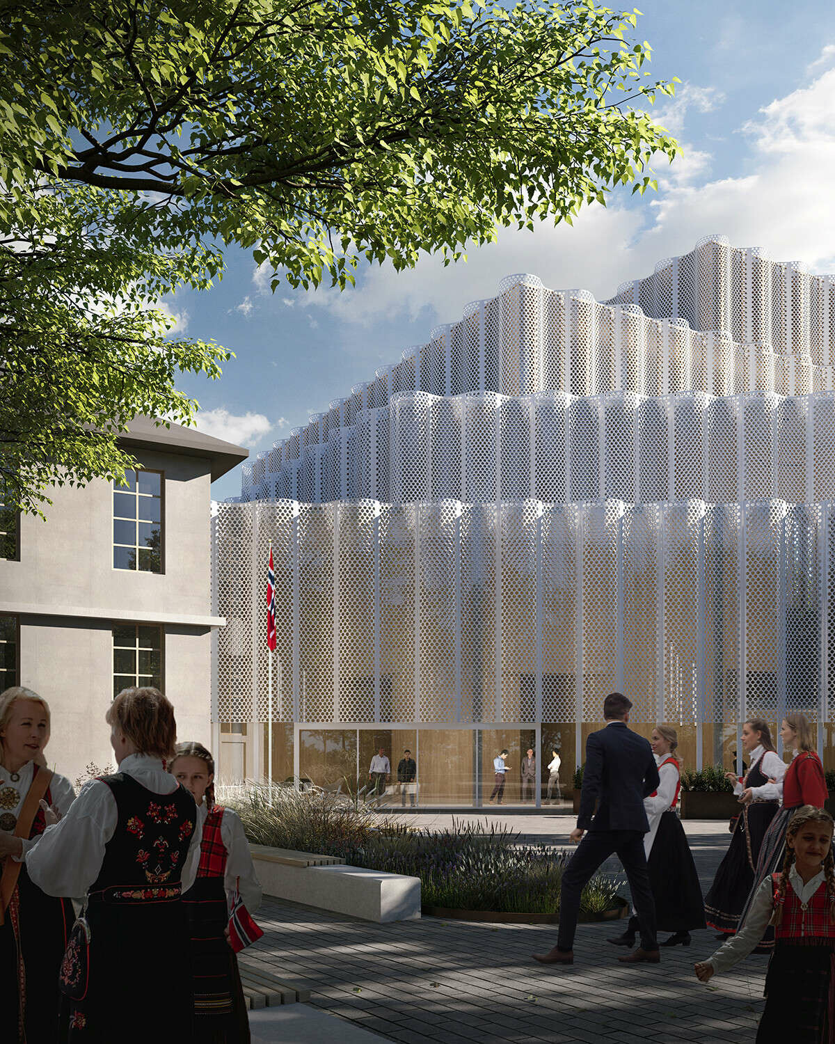 Das perforierte, helle Aluminium umschließt symbolisch den Raum für Kultur und Kunst, während gleichzeitig der Blick ins Innere gewährt wird.