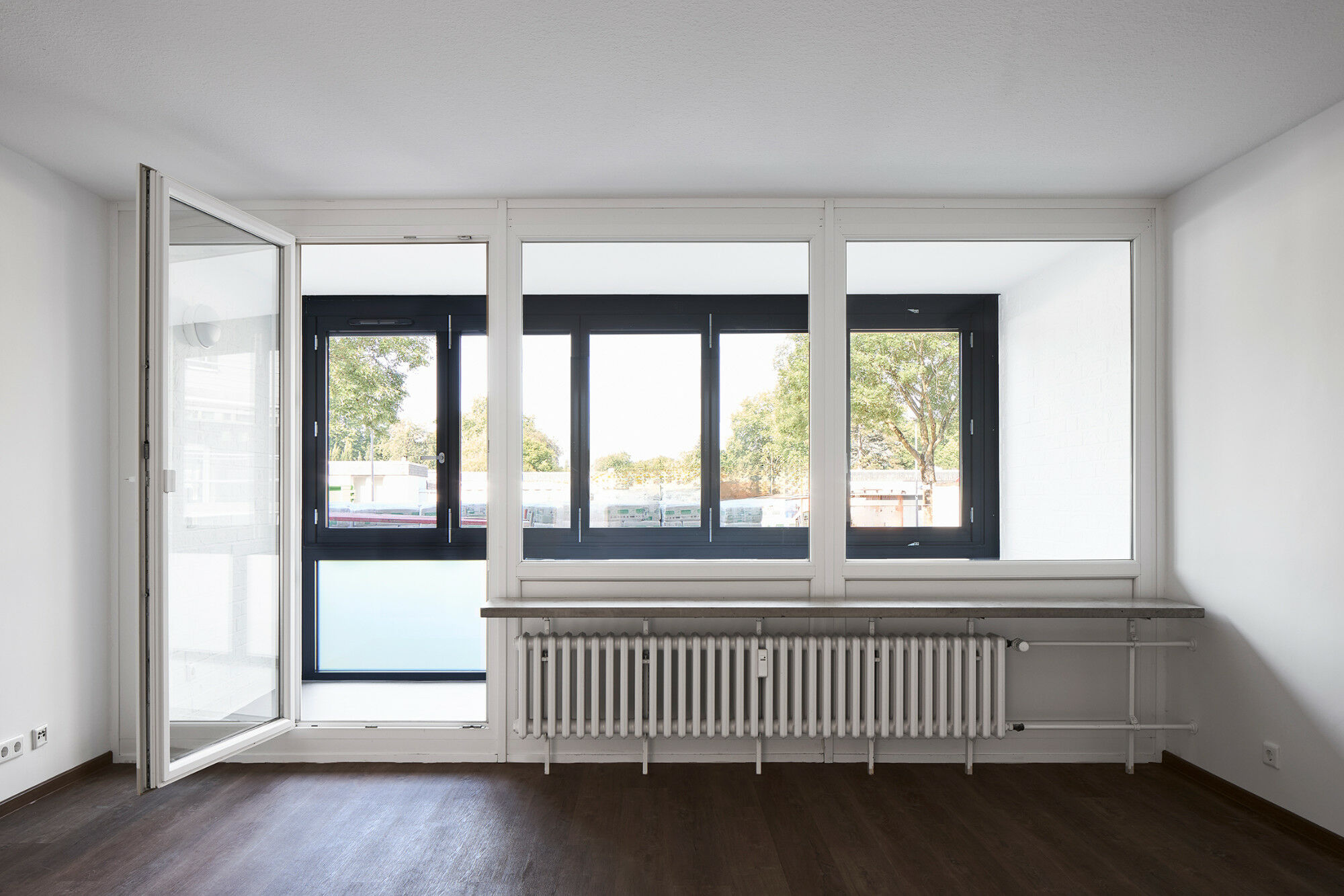 Falt-Schiebe-Fenster aus Aluminium von Schüco werten die Loggien zu ganzjährig nutzbarem Wohnraum auf.