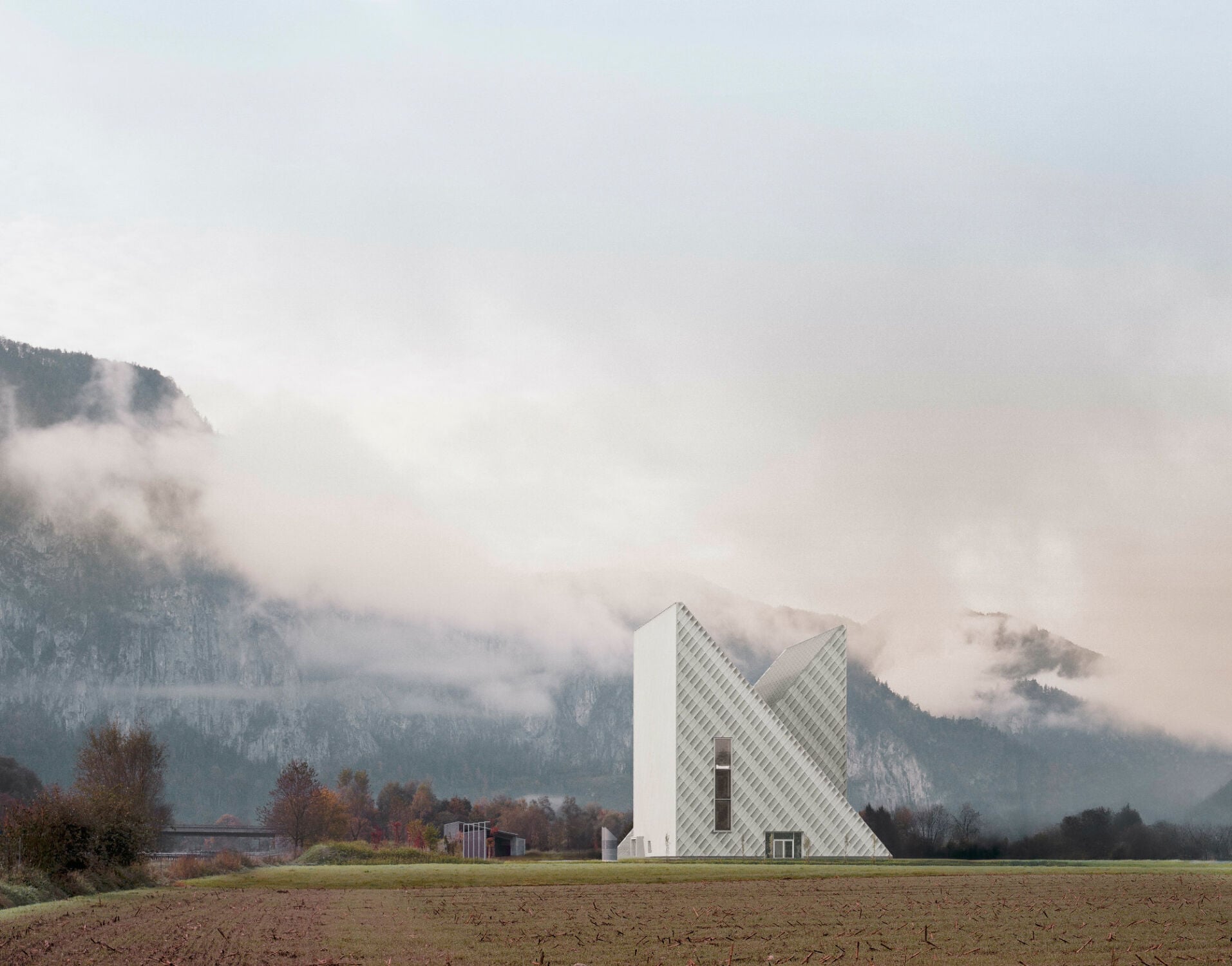 Der imposante Bau aus zwei ineinandergeschobenen Dreiecksprismen weckt Assoziationen an die umliegende Alpenlandschaft.