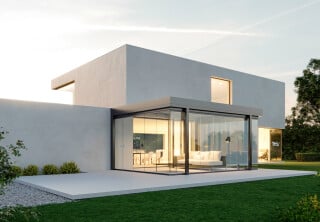 Passive Sonnenenergienutzung durch gläserne Wohnhauserweiterung (SDL Acubis mit Schiebe-Dreh-System SL 25 XXL von Solarlux.