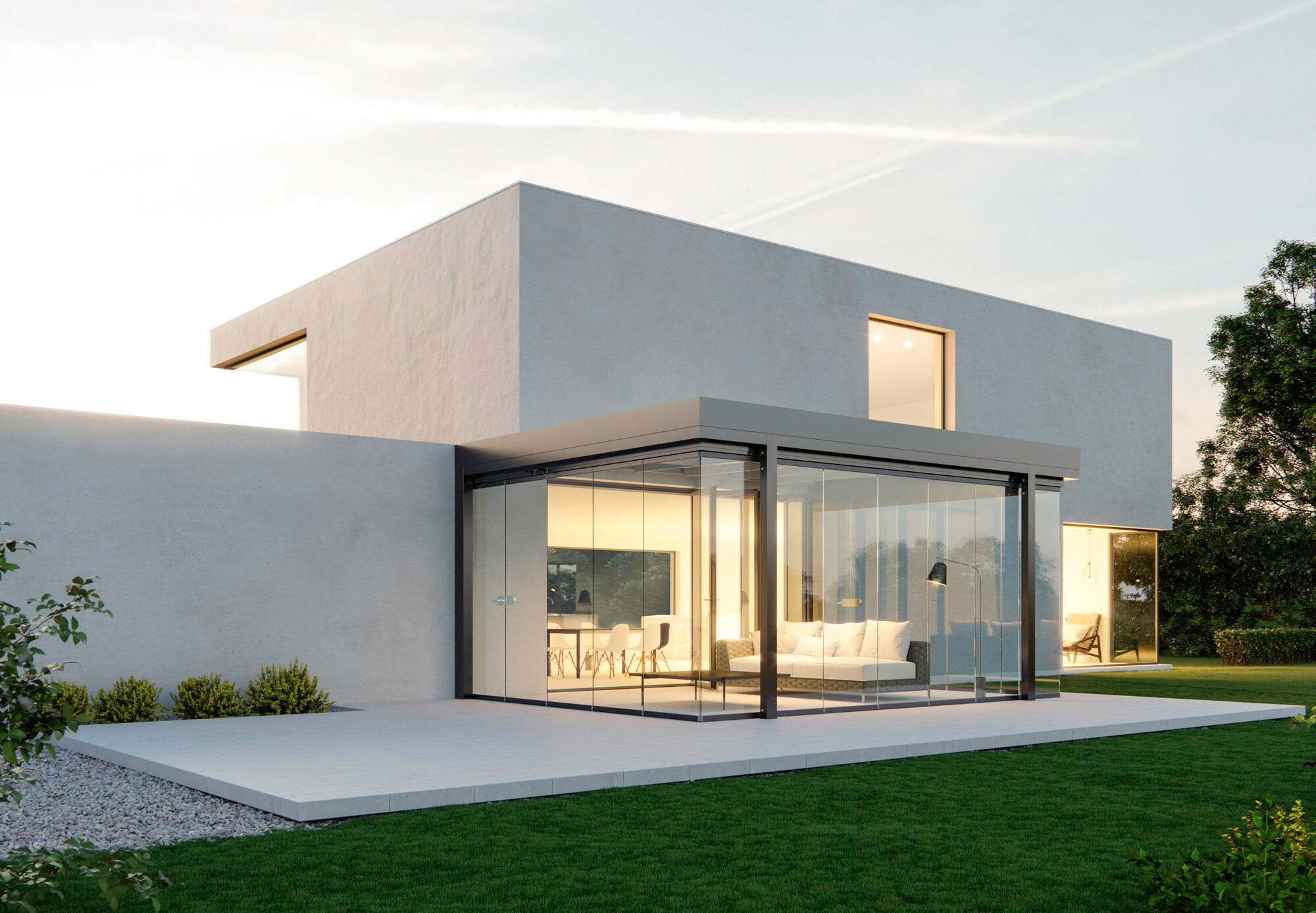 Passive Sonnenenergienutzung durch gläserne Wohnhauserweiterung (SDL Acubis mit Schiebe-Dreh-System SL 25 XXL von Solarlux.