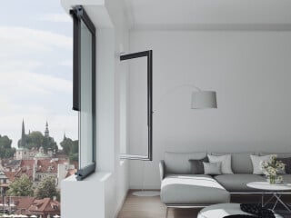 Vertikaljalousien mit verschiedenfarbigen Lamellen tragen zur individuellen Gestaltung eines Raumes bei.