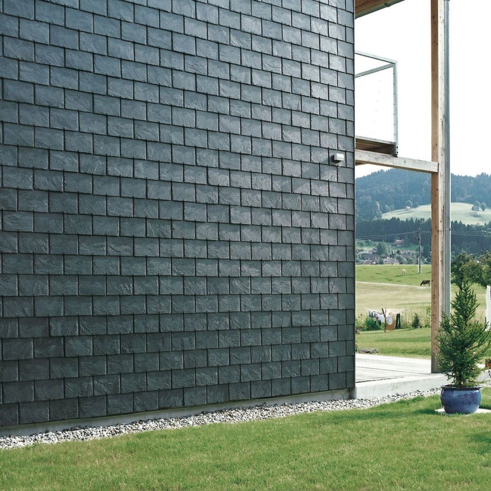 Rechteck-Doppeldeckung an der Fassade eines Einfamilienhauses in Appenzell von Bruno Bottlang, St.Gallen